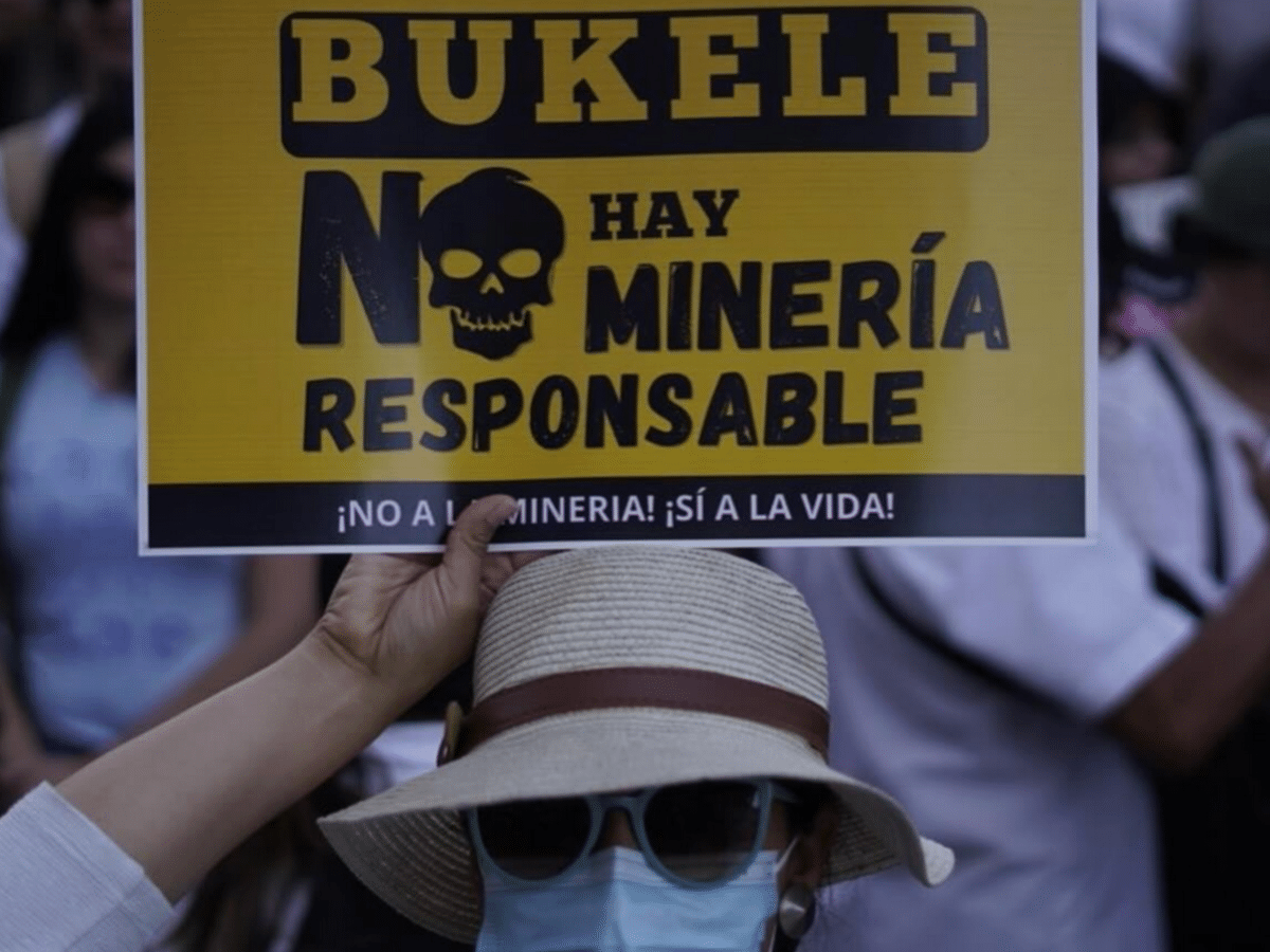 A protester in El Salvador demonstrates against metallic mining after President Nayib Bukele overturned...