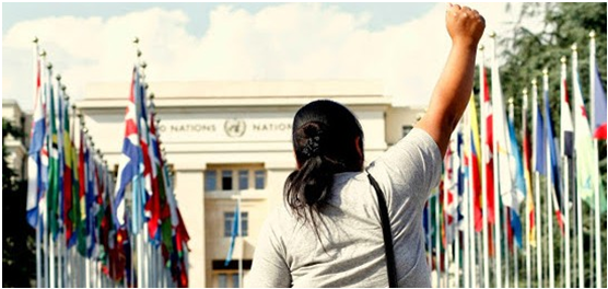 Women standing in front of United Nations High Commissioner for Human Rights in Geneva